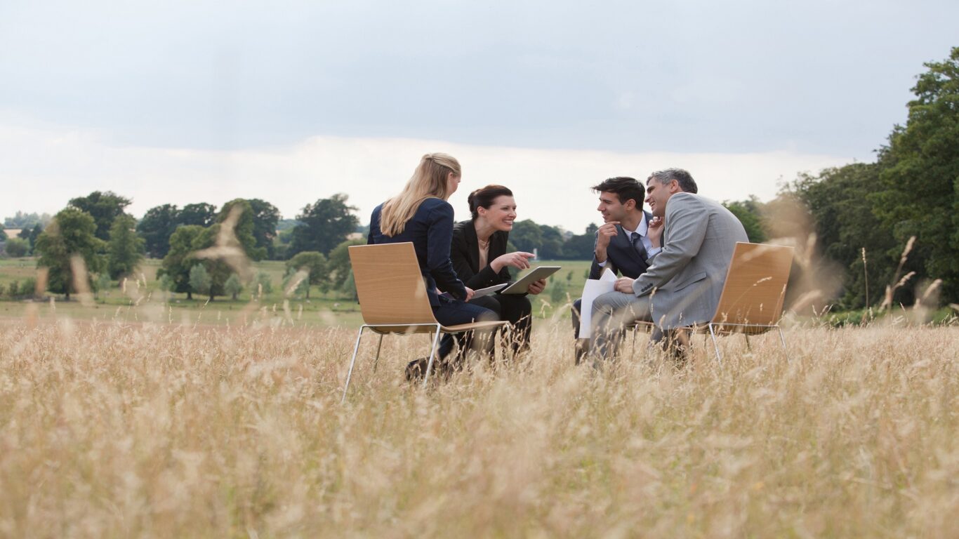 Business people having meeting outdoors